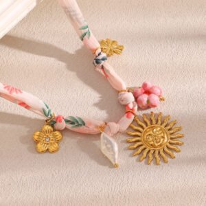 European and American cross-border new niche design stainless steel 18K gold-plated ribbon pendant necklace, sun expression necklace