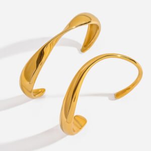 Jingqiao's minimalist design, 18K gold and stainless steel polished twisted irregular open stainless steel bracelet.